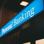 Blue and white personal banking sign